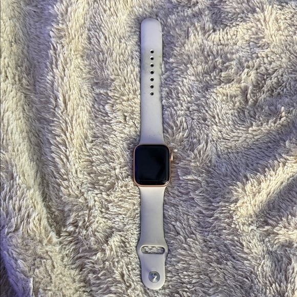 Smartwatch with White Band and Gold Case
